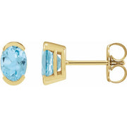 14K Yellow 6x4 mm Natural Sky Blue Topaz Stud Earrings