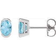 14K White 6x4 mm Natural Sky Blue Topaz Stud Earrings