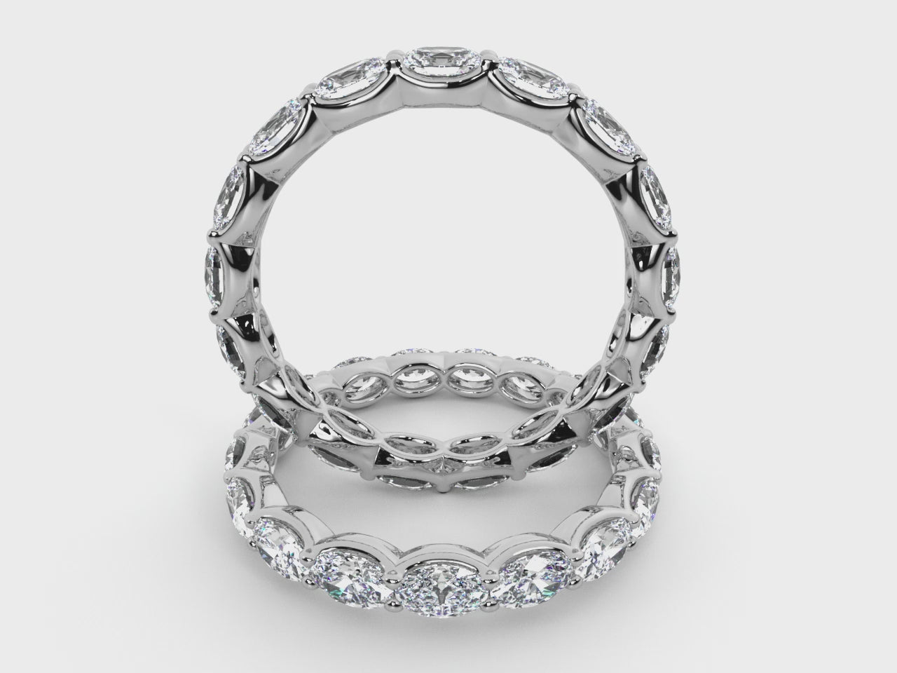 Load video: Oval Natural Diamond East-West Eternity Band