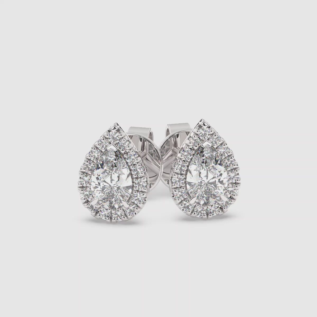 Load video: Pear Single Halo Earrings