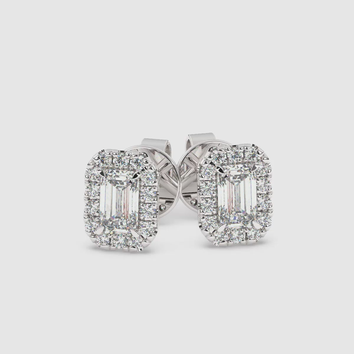 Load video: Emerald Single Halo Earrings